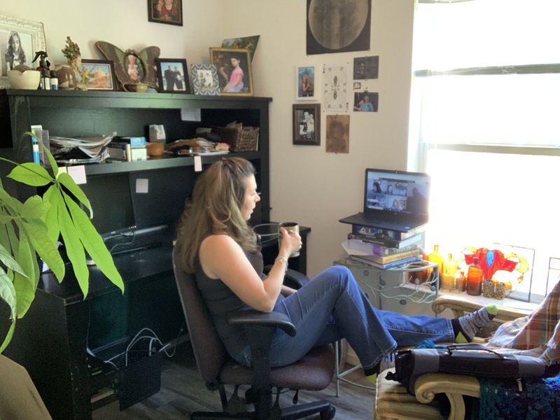 Image of a woman working from home.