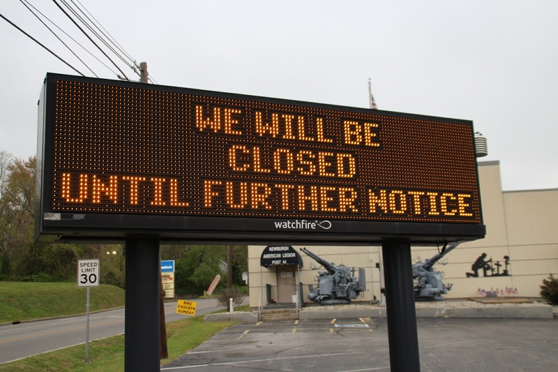 A digital sign reading "We will be closed until further notice".