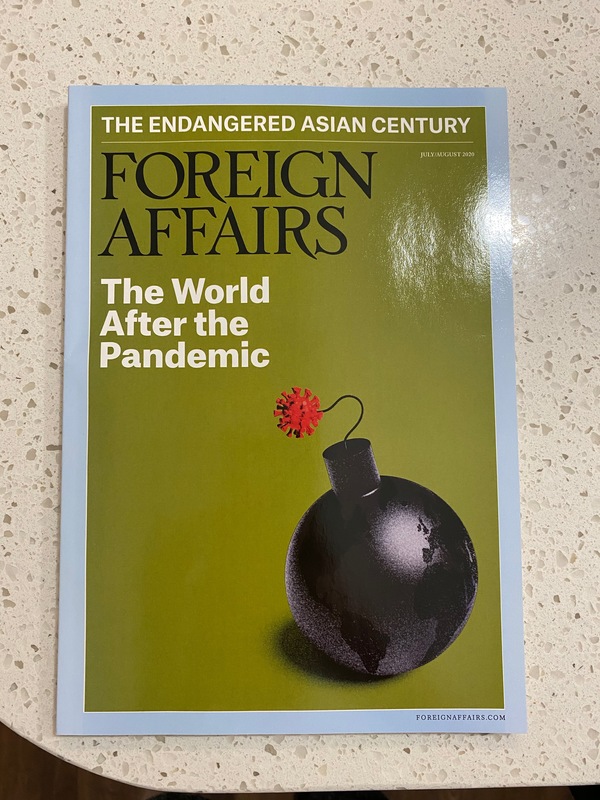 Foreign Affairs magazine titled "The World After the Pandemic" with picture of the globe as a bomb and the lit fuse being a representation of the coronavirus.