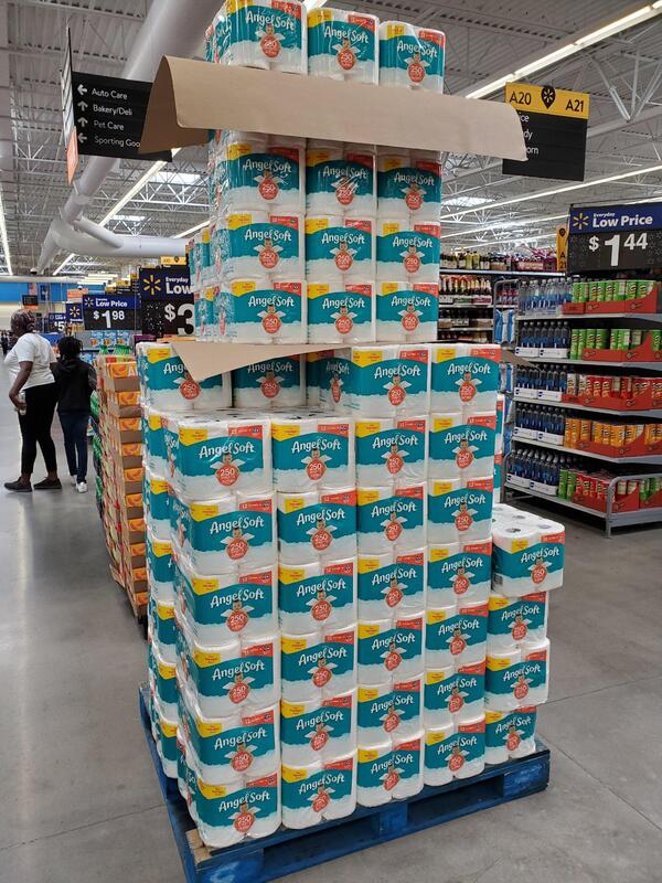 A picture of toilet paper for sale at a Walmart. 