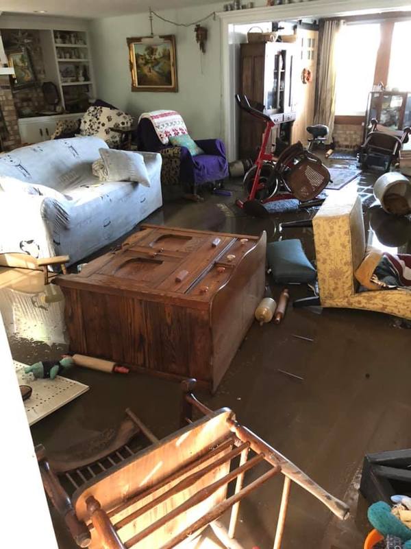 Image of a home in the aftermath of a flood.