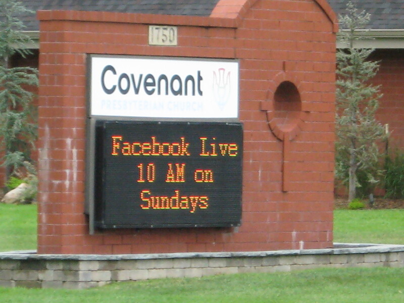 A LED sign outside of a church reading Facebook Live 10 AM on Sundays.