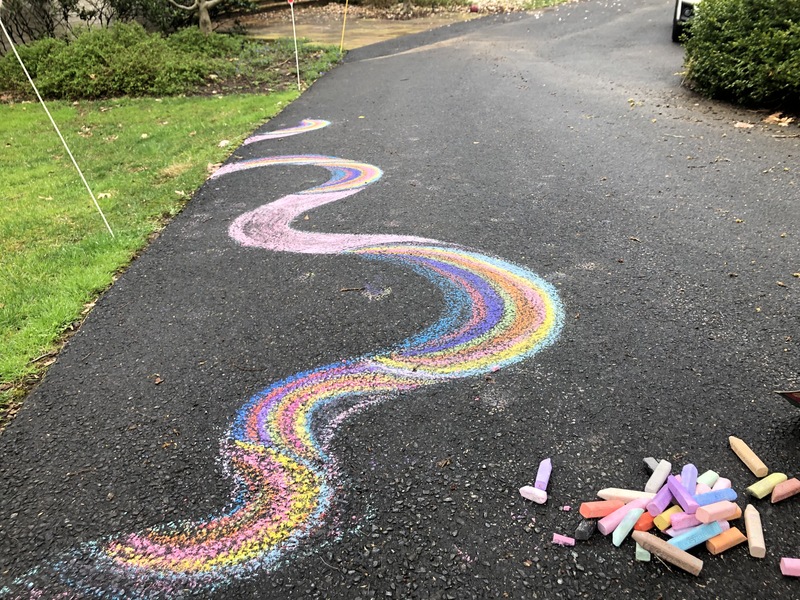 Image of chalk art on a driveway.