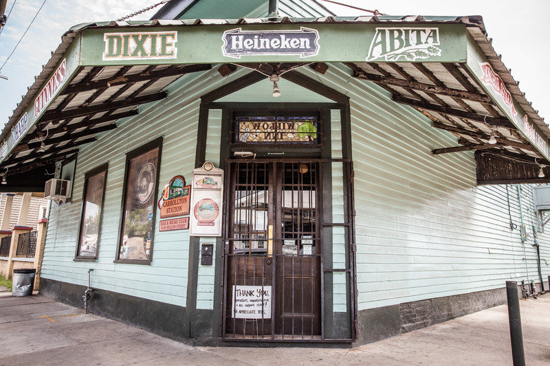 The front door of Carrollton Bar closed, located in New Orleans.