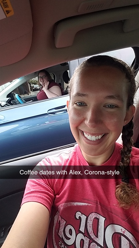 A person is posing taking a selfie in a car with another person behind them in a separate car waving. The caption says: Coffee dates with Alex, Corona-style.