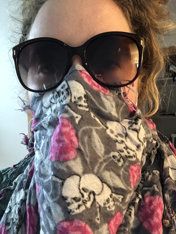 Person with a scarf mask.