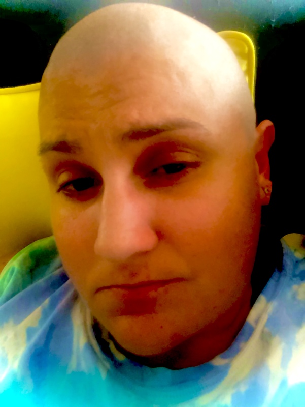 A person with a tye dye shirt.