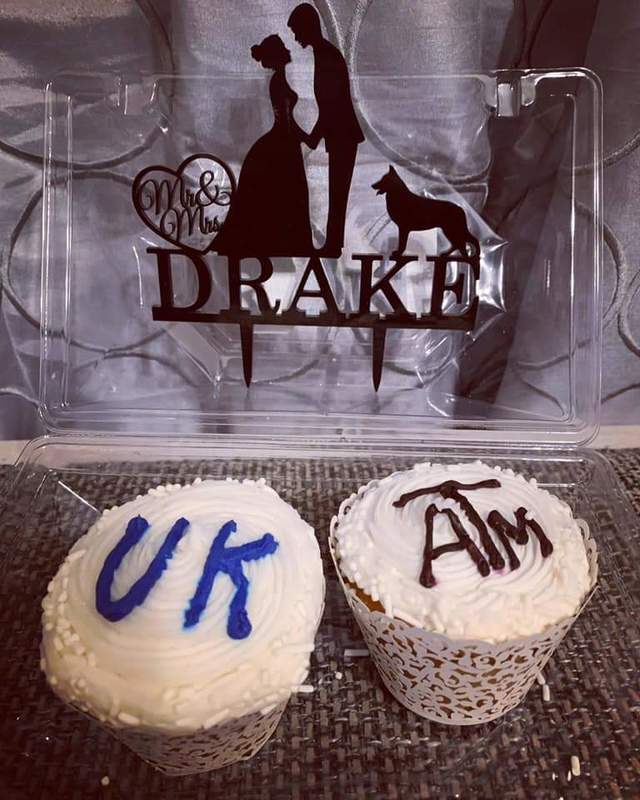 Two cupcakes in a plastic container.