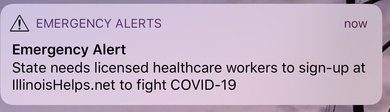 An emergency alert asking for healthcare workers.