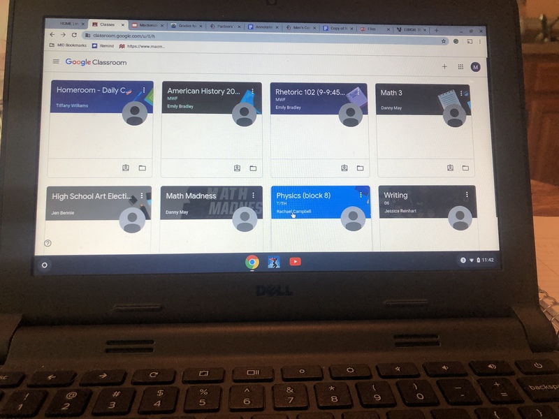 A computer with multiple tabs open.