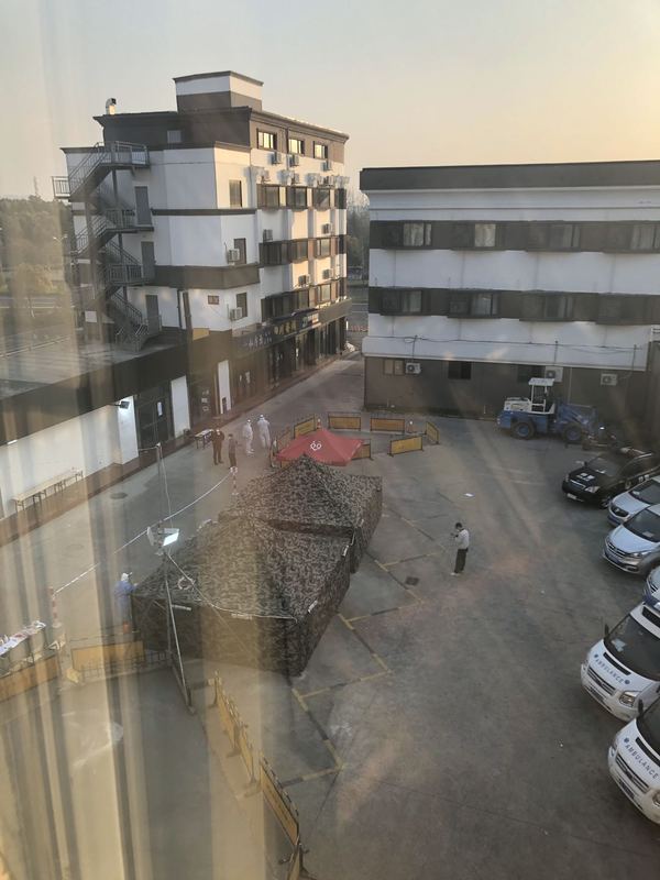 A Covid testing site in a parking lot.