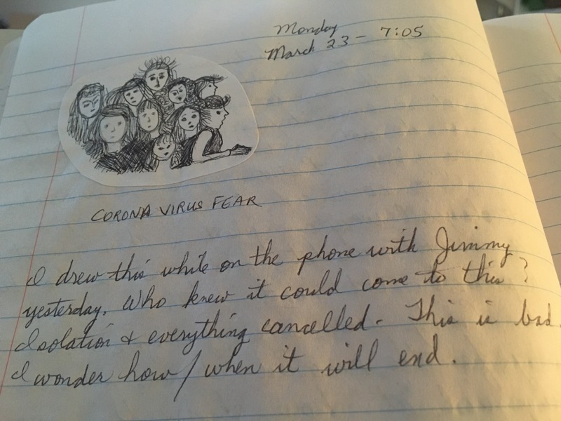 A journal entry in a notebook reflecting about the coronavirus.