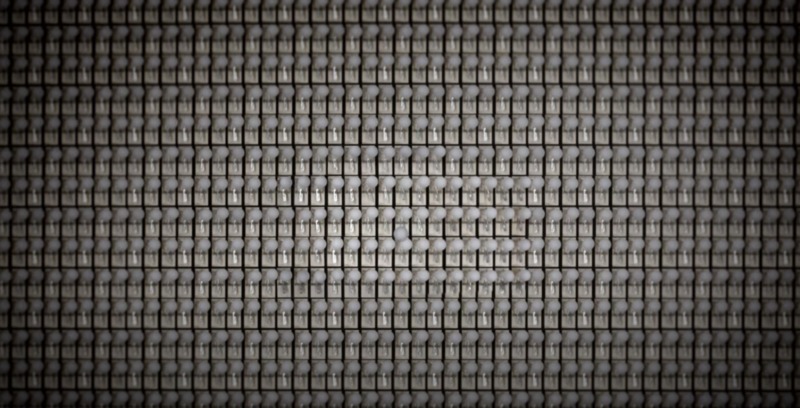 Multiple mouse traps with ping pong balls on them.