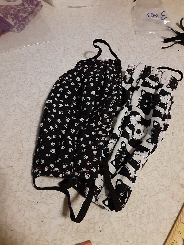 Two masks on a surface.