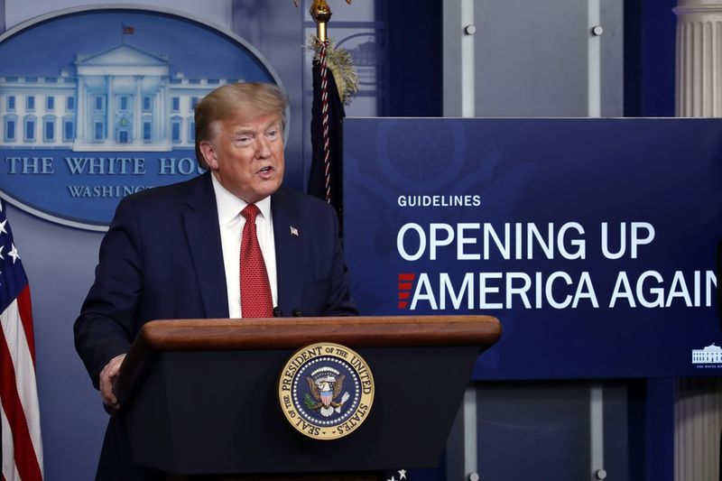 A person standing behind a podium. 