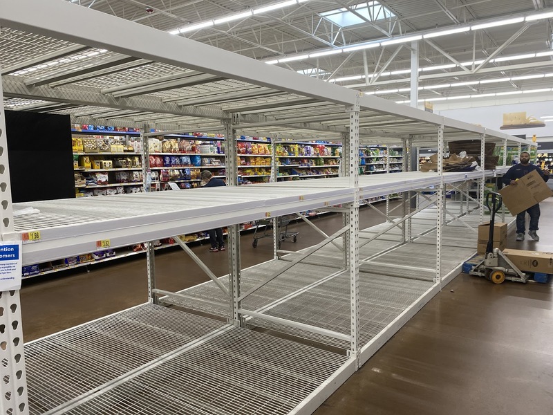 Empty shelves in a Walmart.