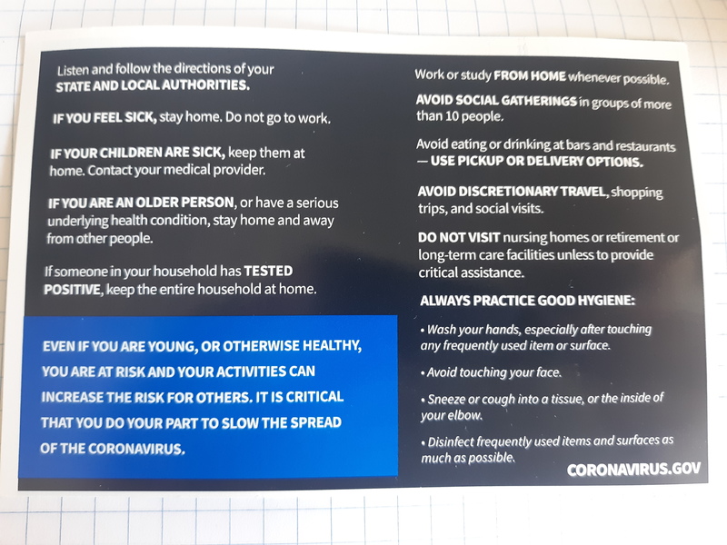 The back of a postcard from the Centers for Disease Control and Prevention that talks about how American can slow the spread, it also gives advice on how to safely social distance and how to have good hygiene.