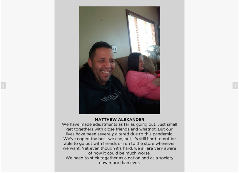 Photo of two people on a couch.