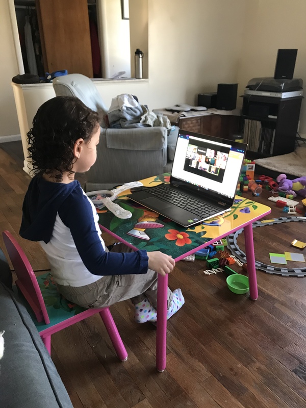 A child in online school.