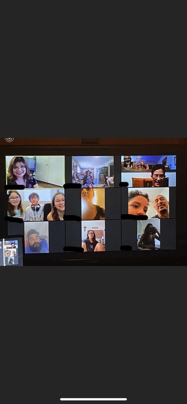 A zoom meeting with multiple people.