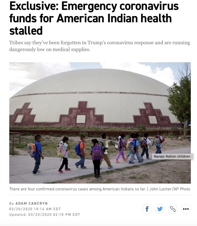 Children walking in front of a dome. 