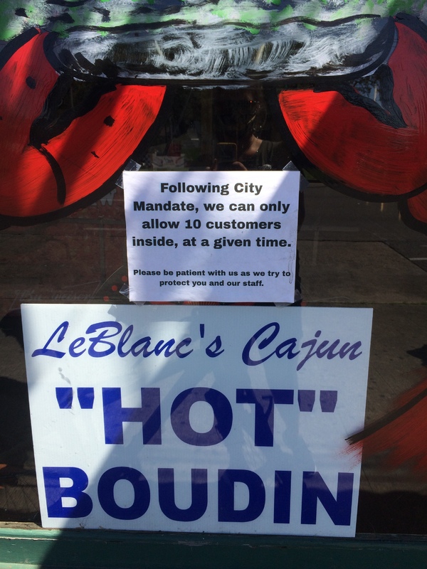 A sign outside of a seafood restaurant.