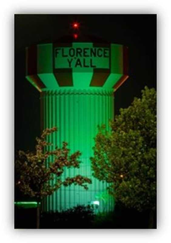 A building with green lights.