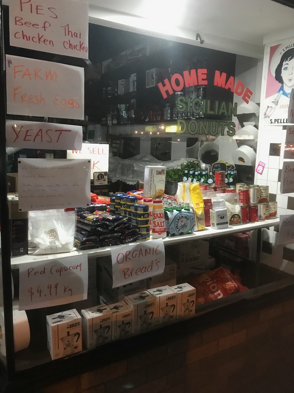 Groceries in front of a cafe.