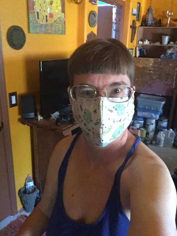 A woman with a mask on.