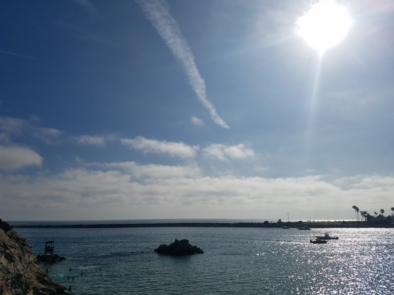 A photo of a body of water at the beach. 