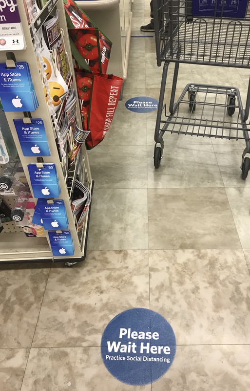 Blue stickers on the ground.