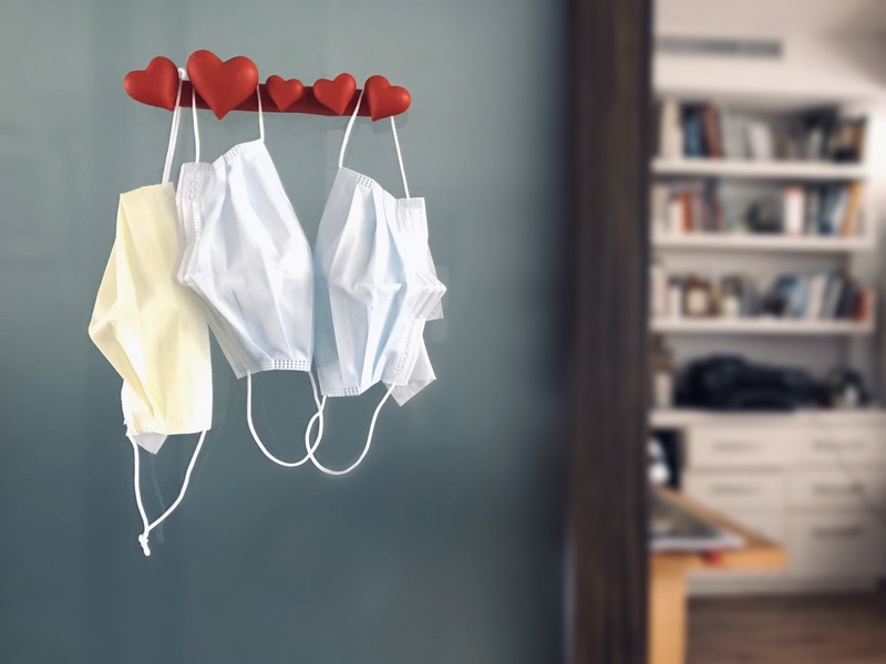 Face masks hanging off a wall. 