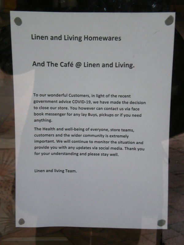 A sign about a store closing.