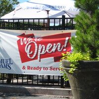 An open sign at a restaurant.