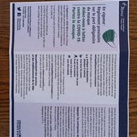 A pamphlet in French detailing mandatory masking procedures.