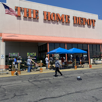 Photo of a line outside a Home Depot store.