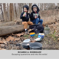 Photo of two children camping.