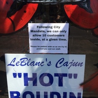 A sign outside of a seafood restaurant.