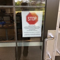 A sign at an assisted living home that reads "Limited Visitors Only".