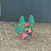 Play equipment wrapped up in rope.
